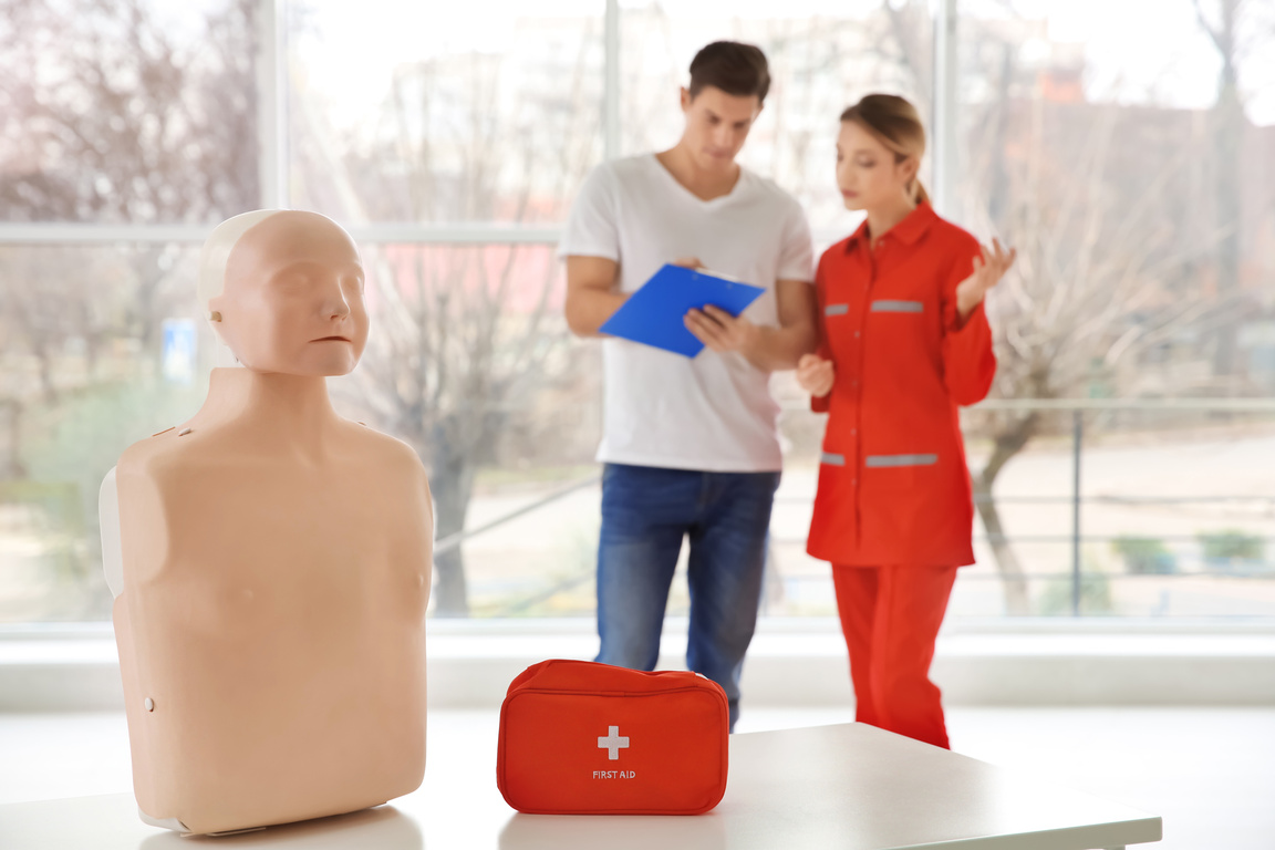 First Aid Mannequin on Table at CPR Class